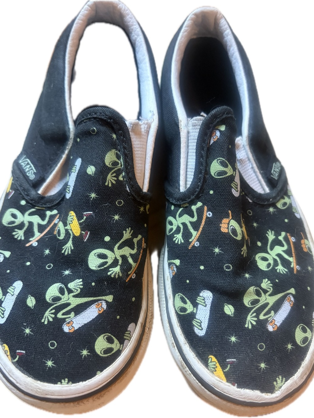 Vans Kids Black Slip-On Sneakers with Green Alien Skate Print